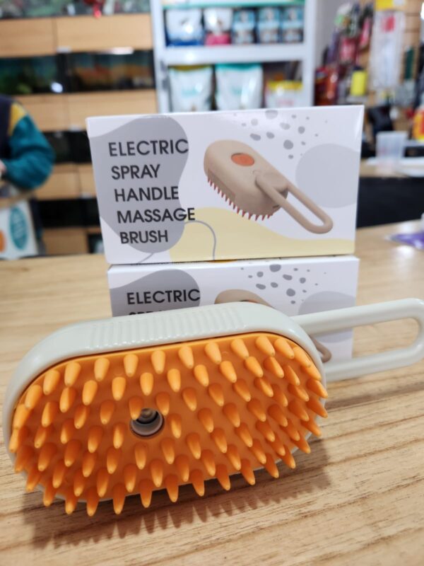 Cepillo masaje quita pelo a vapor con manija